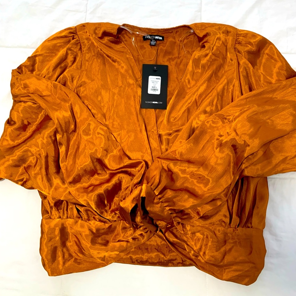 Women’s fashion nova satin top.